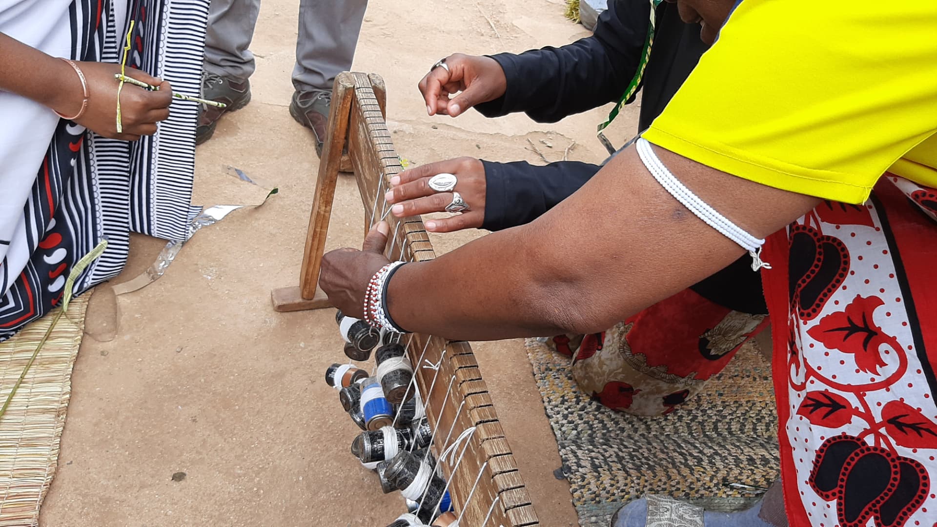 Weaving in progress on a wooden frame